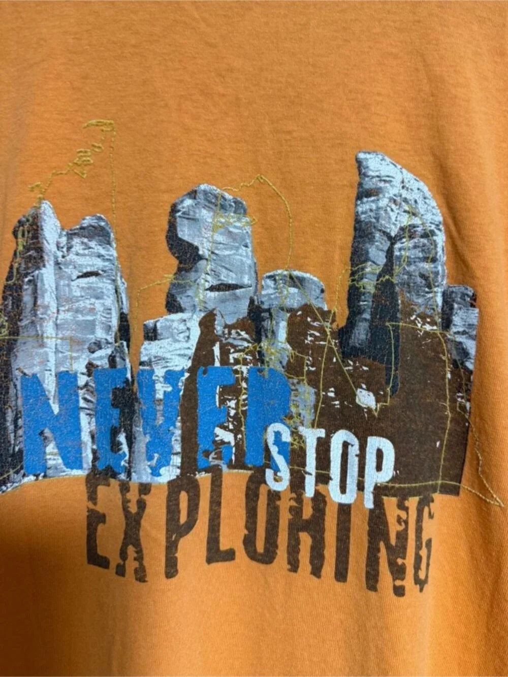 The North Face “Never Stop Exploring” Graphic Tee Orange Men’s Large